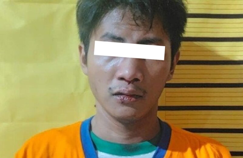 Tersangka berinisial MMH (27) saat diamankan di Mapolsek Tambaksari Surabaya /Istimewa