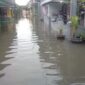 Salah satu pemukiman di desa yang terendam banjir akibat hujan Selasa (24/3) di Pasuruan. (Foto: dok BPBD Pasuruan)