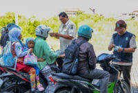Pemkot bersama Bapeda Jatim melakukan razia gabungan terhadap kendaraan yang pajak kendaraanya mati. (Foto: Dok Diskominfo Surabaya)