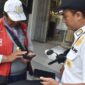 Sosialisasi dan pendaftaran parkir digital. (Foto: dok Satpol PP Surabaya)